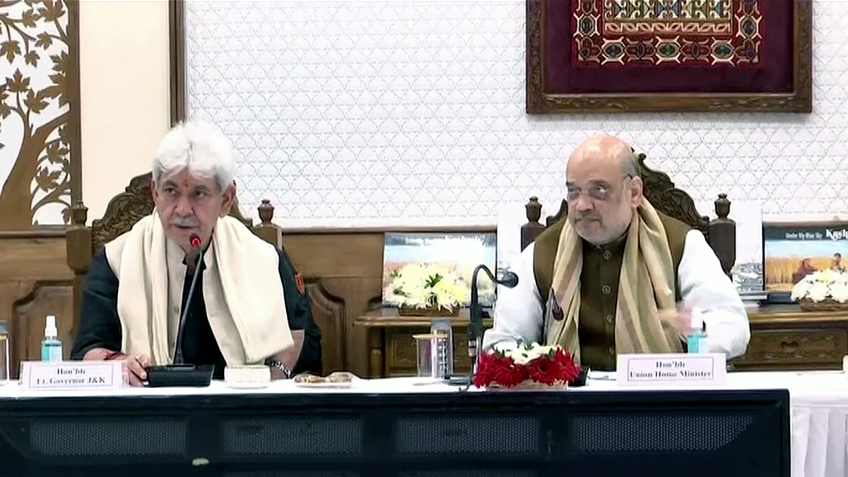 Union Home Minister Amit Shah with Lieutenant Governor of Jammu and Kashmir Manoj Sinha chairs a security review meeting during his three-day visit, in Srinagar on Saturday, October 23, 2021.