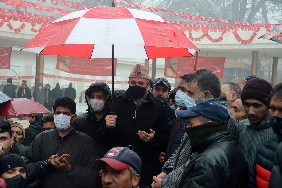 National Conference Vice President Omar Abdullah offering prayers at the grave of Sheikh Abullah along with other party members in Srinagar, on Sunday 5 December 2021.