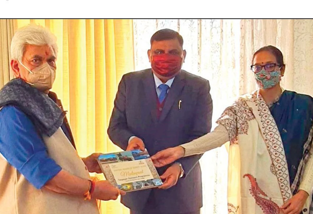 Taxpayer Outreach Programme |PCIT Srinagar, Jammu present book to LG Manoj Sinha