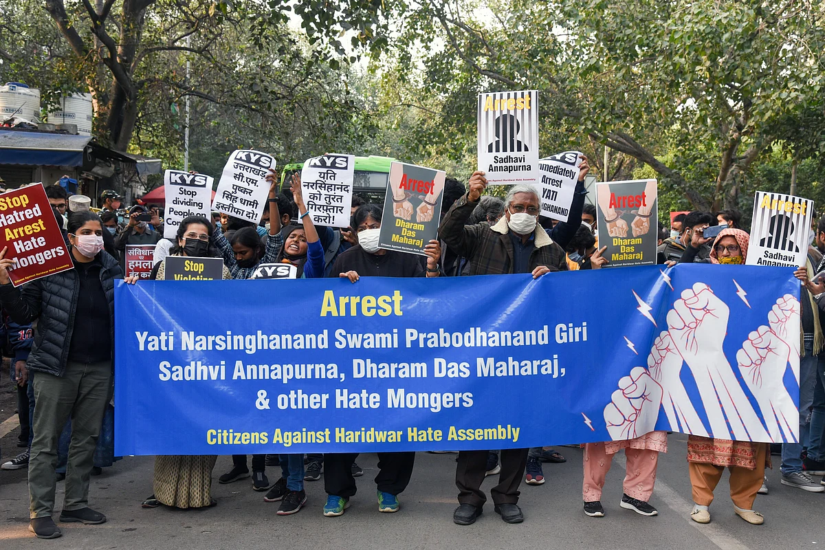 Krantikari Yuva Sangathan (KYS) and other organisations supporters stage a demonstration against the hate speech in Haridwar and demand the arrest of the accused, outside Uttrakhand Bhawan, in New Delhi.