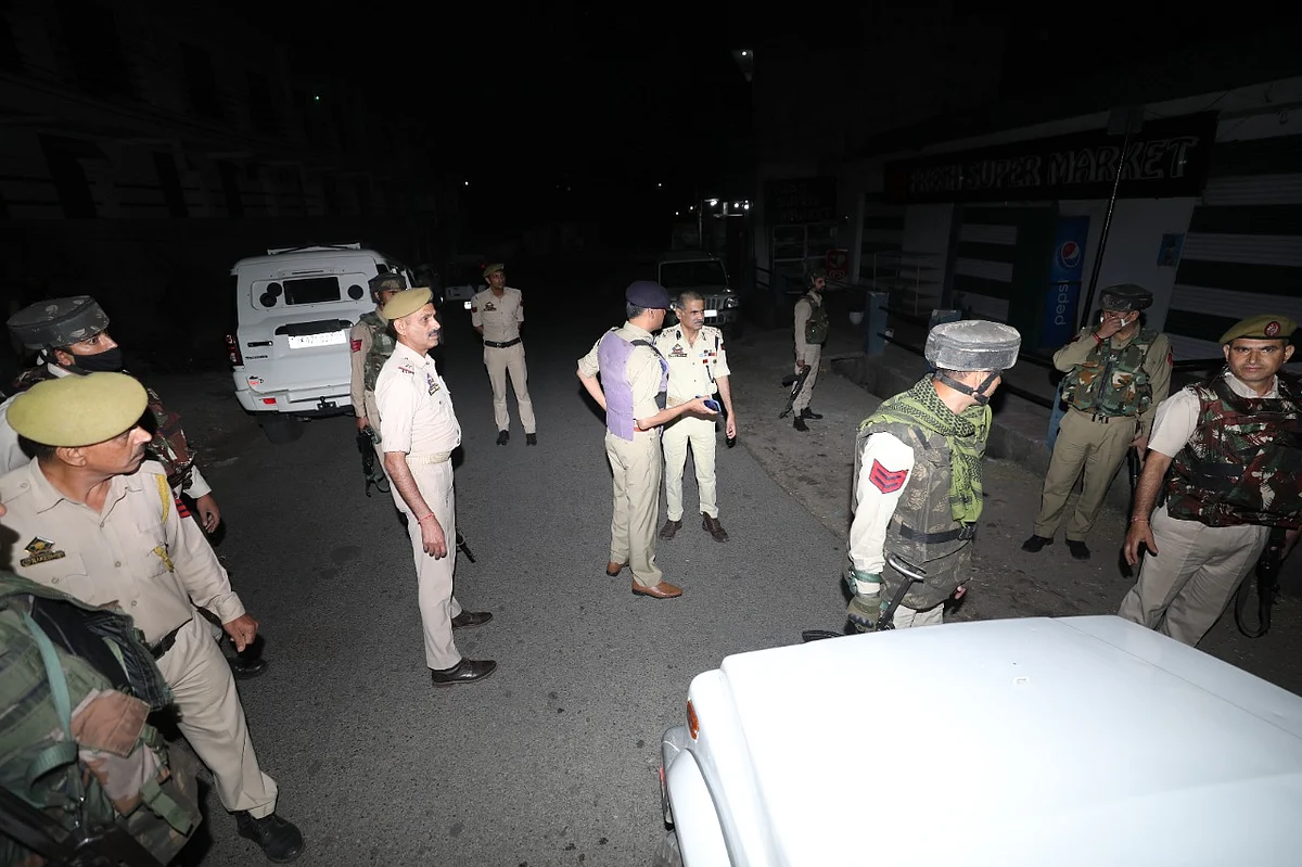 Cops gather at the encounter site in Jammu