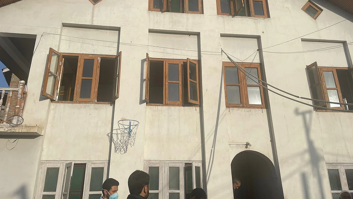 SIA officials at the residence of Aala Fazili in Humhama