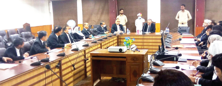 Justice Magrey chairs meeting of Judicial Officers at DCC Mominabad