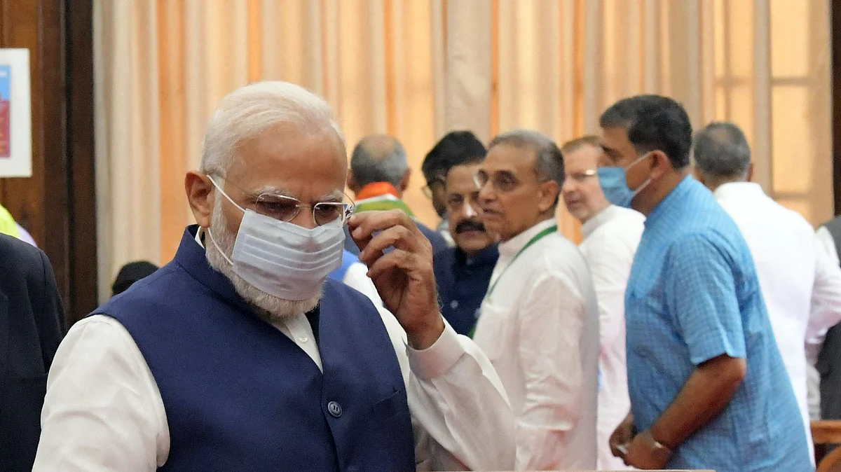 Prime Minister Narendra Modi casts his vote for the Presidential elections, at Parliament, in New Delhi on Monday.