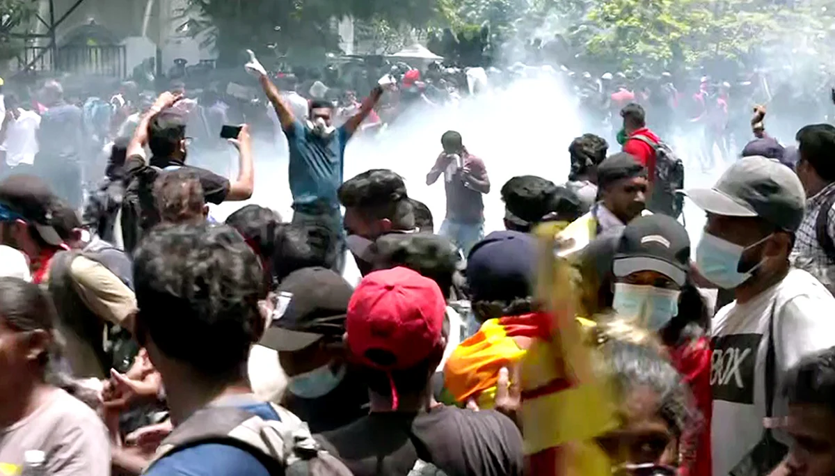 Security forces use tear gas shells to disperse protestors outside Sri Lankan prime minister Ranil Wickremesinghe's residence, in Colombo on Wednesday.