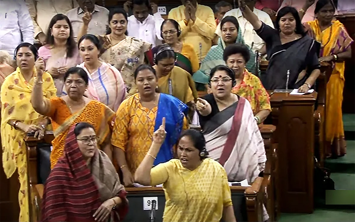 BJP MPs protest against Congress MP Adhir Ranjan Chowdhury's 'Rashtrapatni' remark against President Droupadi Murmu, in the Lok Sabha during the Monsoon Session of Parliament, in New Delhi on Thursday.