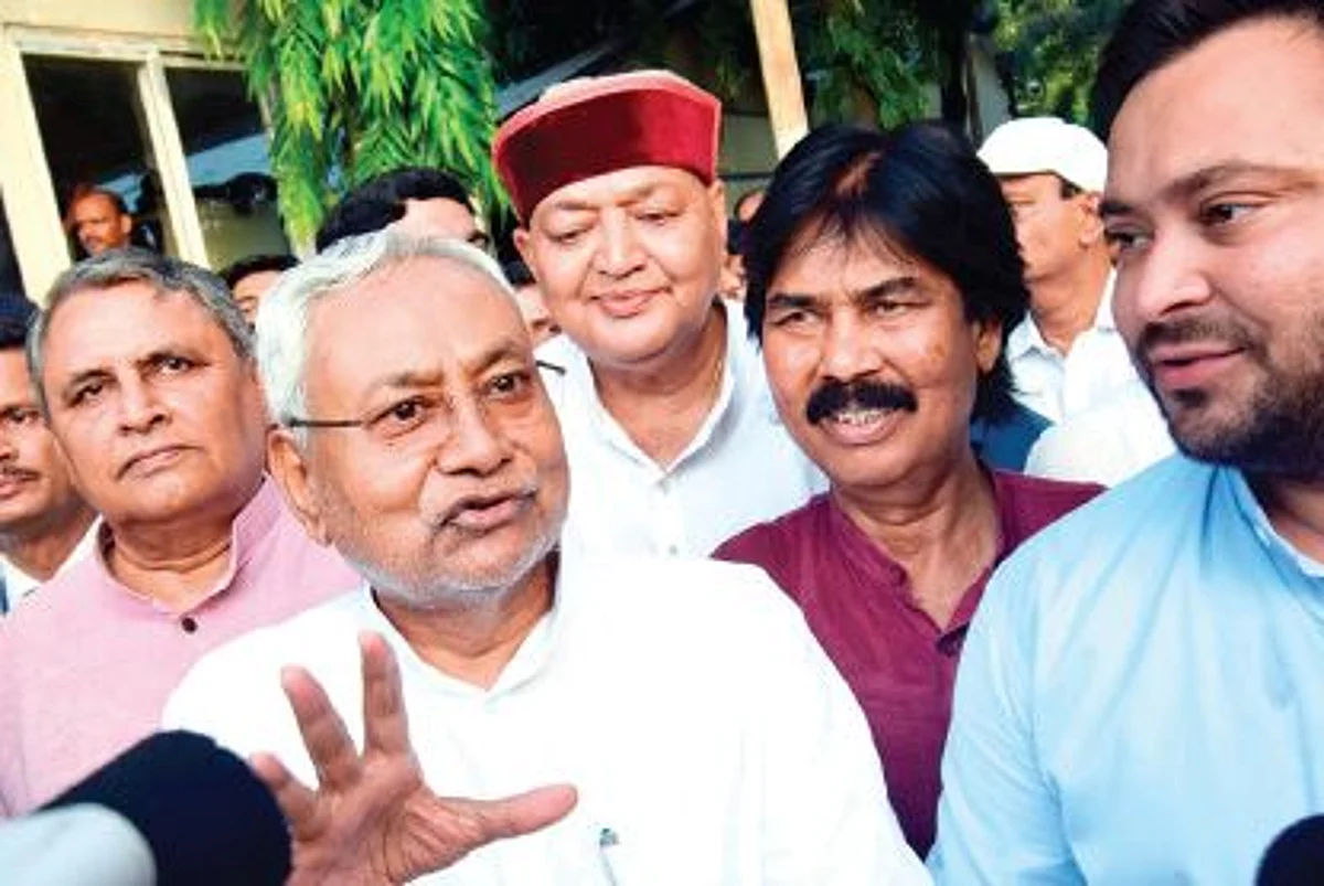 Janata Dal (United) leader Nitish Kumar with Rashtriya Janata Dal
leader Tejashwi Yadav speaks to media after meeting Bihar Governor Phagu Chauhan in Patna on Tuesday.