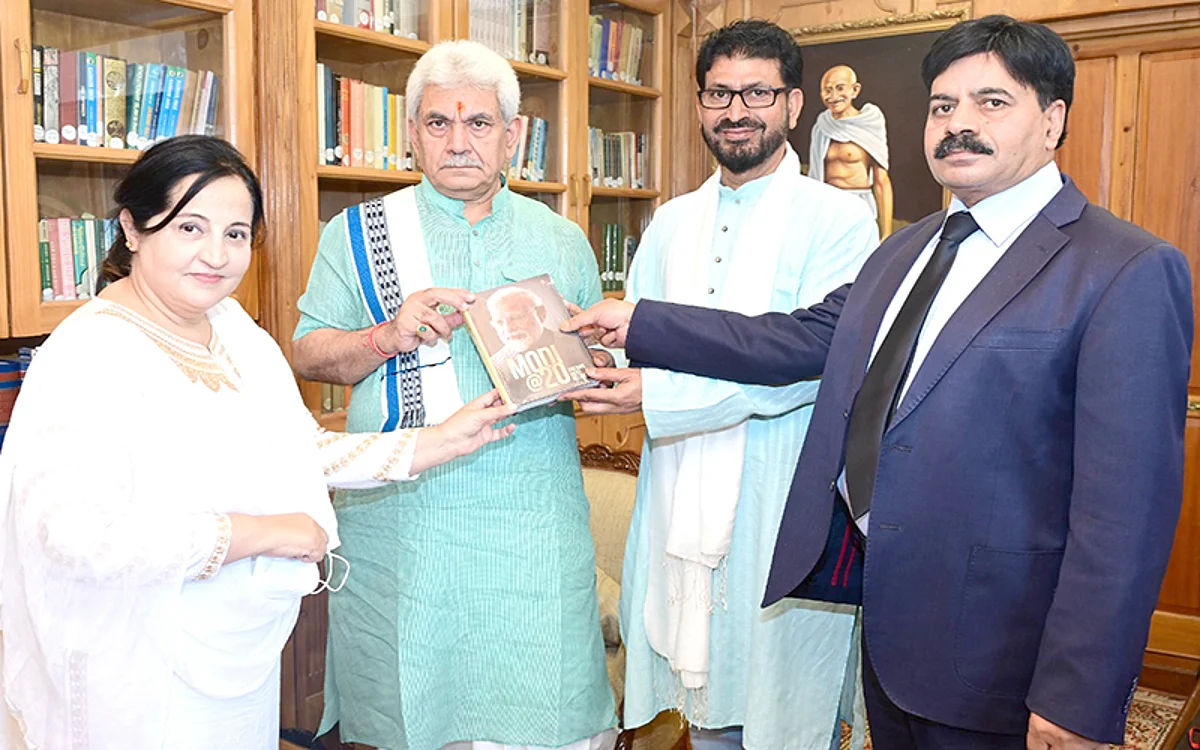 LG Sinha presented book on PM Modi