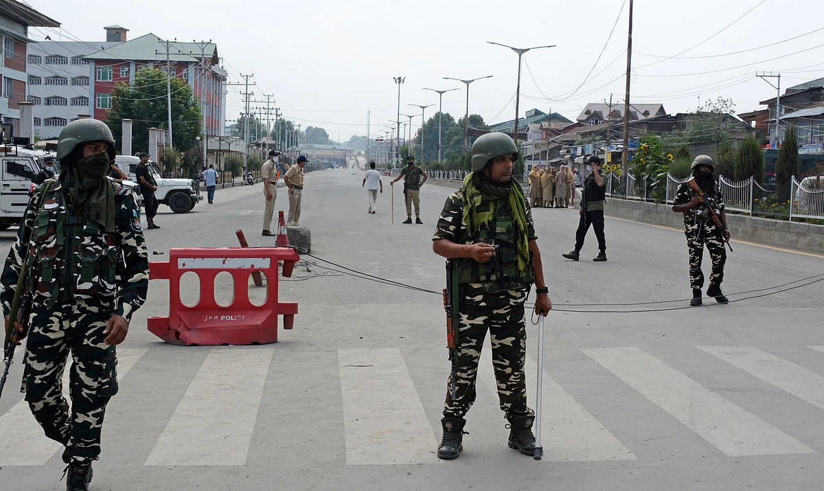 Paramilitary forces stand guard during Muharram restrictions in Srinagar on Sunday August 7,2022.