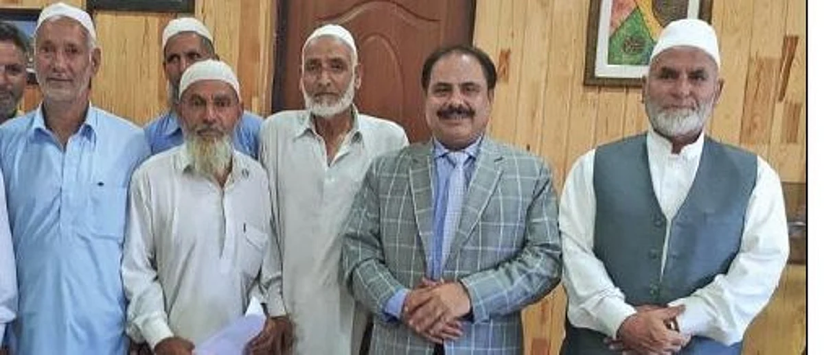 A group of senior citizens call on Dr. Mushtaq A Rather, Director Health Services Kashmir.