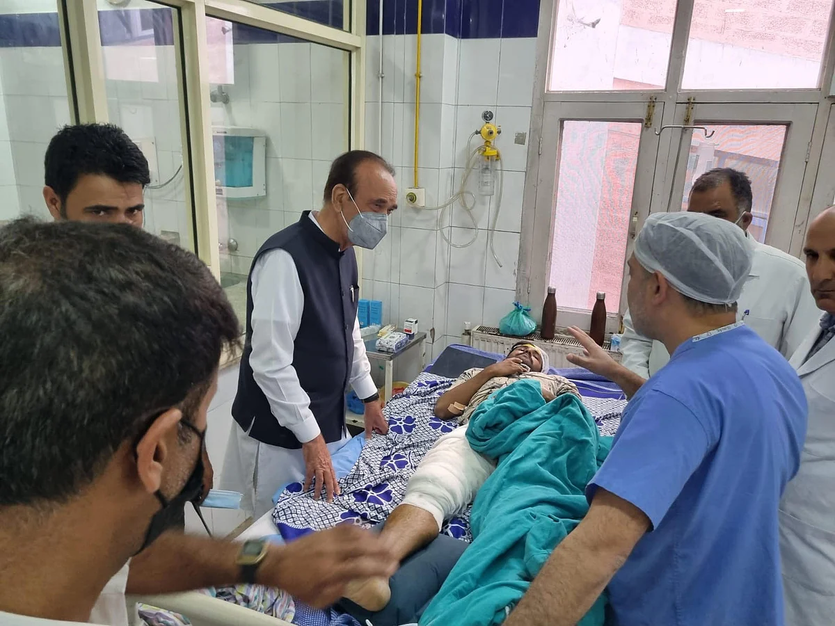 Mr Azad visits injured boys at Barzulla hospital on Friday.