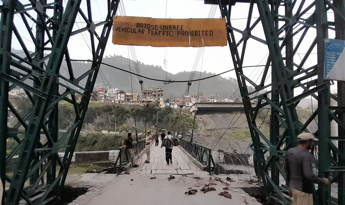 The distressed condition of the bridge is further aggravated by the impact of the loaded trailer.