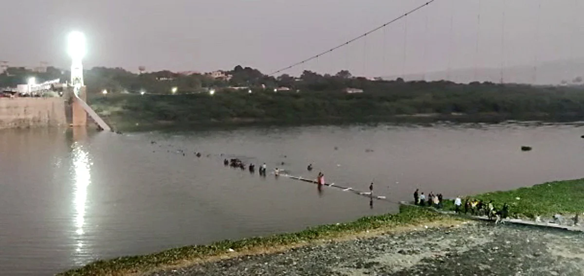 A cable bridge collapsed in the Machchhu river, in Morbi on Sunday.