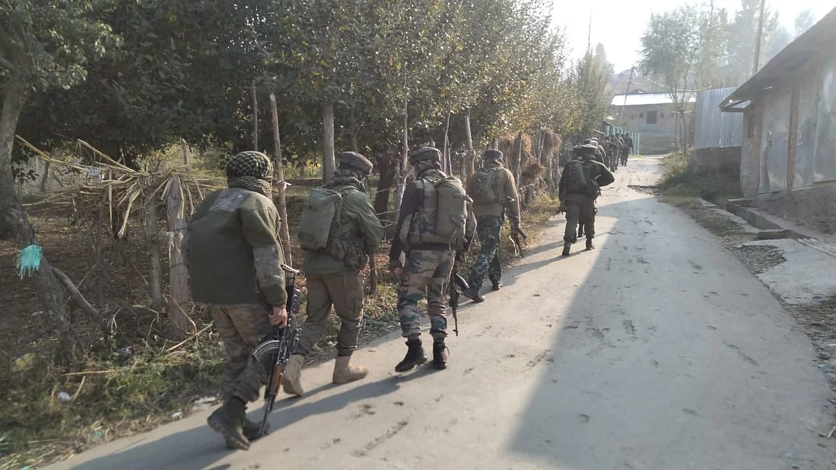 The gunfight entered the second day on Thursday and a massive hunt was on inside a dense forest, Police said.