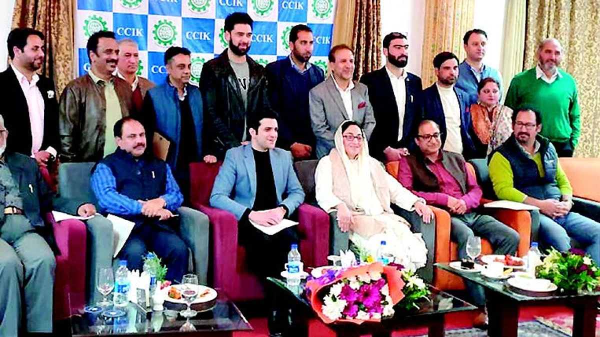 Darakhshan Andrabi greets Tariq Ghani for his re-election as President CCIK