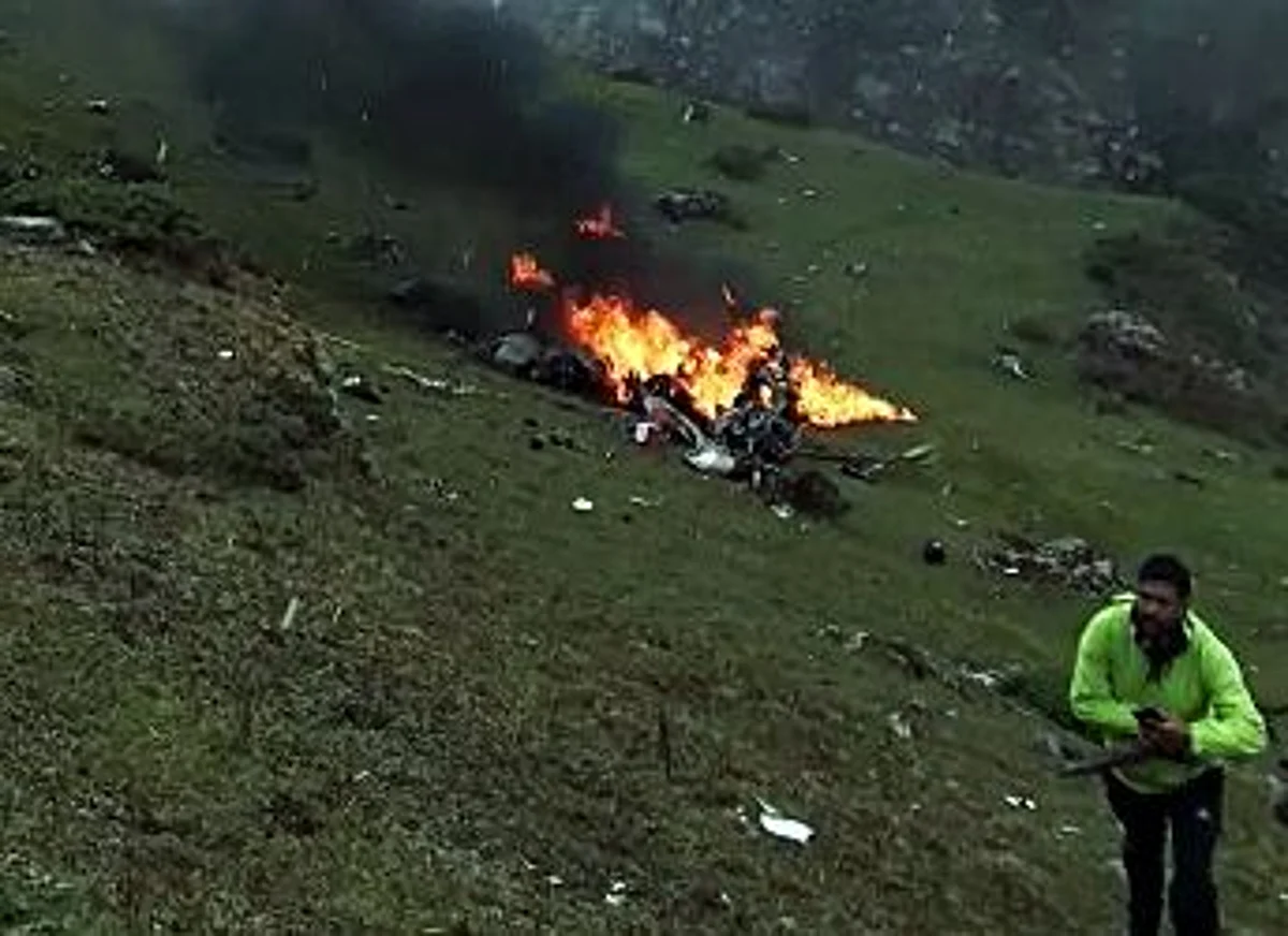 Flames and smoke billow out after a helicopter carrying Kedarnath pilgrims from Phata crashed, on Tuesday. Approximately, Seven people were killed in the chopper crash.
