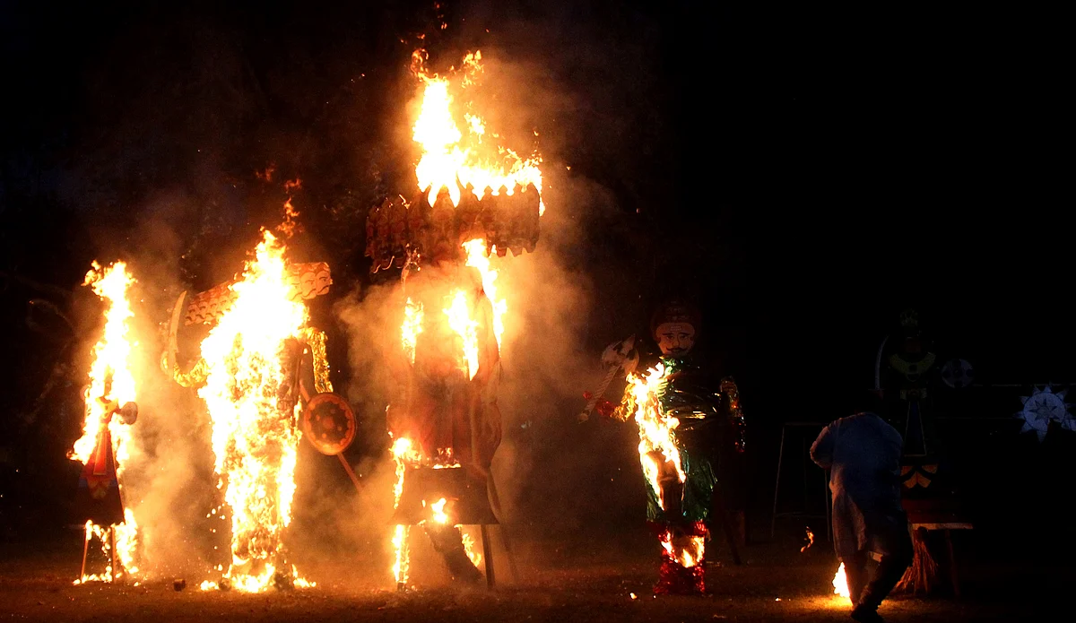 Effigies of Ravan are burned on the occasion of Hindu Festival Dussehra in Srinagar on Wednesday.