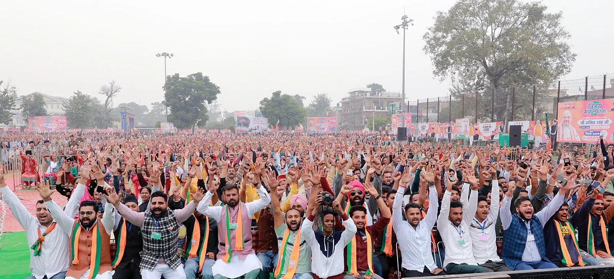 Bharatiya Janata Party (BJP) supporters attend a public meeting addressed by Union Home Minister Amit Shah for the upcoming Himachal Pradesh Assembly elections, at Gurudwara Paonta Sahib, in Sirmaur on Thursday.