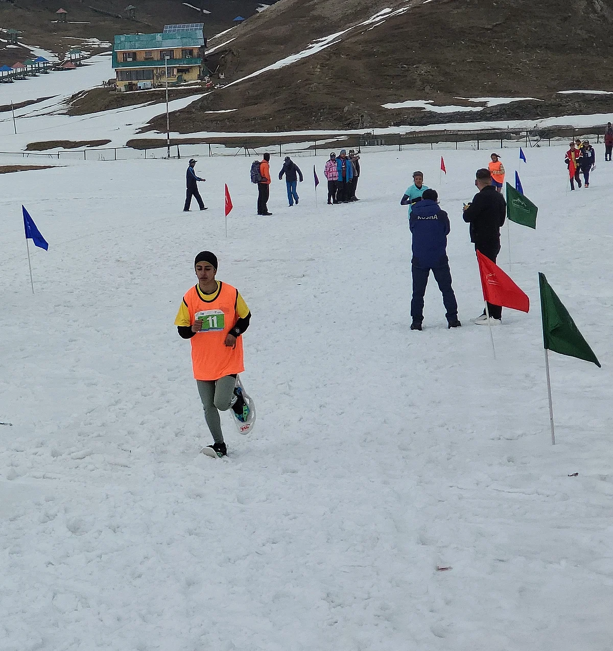 A boy treads during the SnowShoe competition at Gulmarg in March this year.