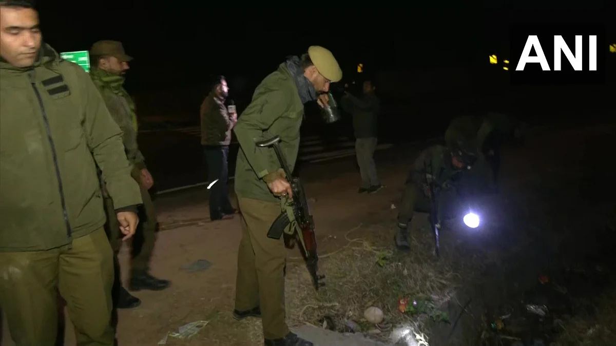 Police conduct searches around the spot.