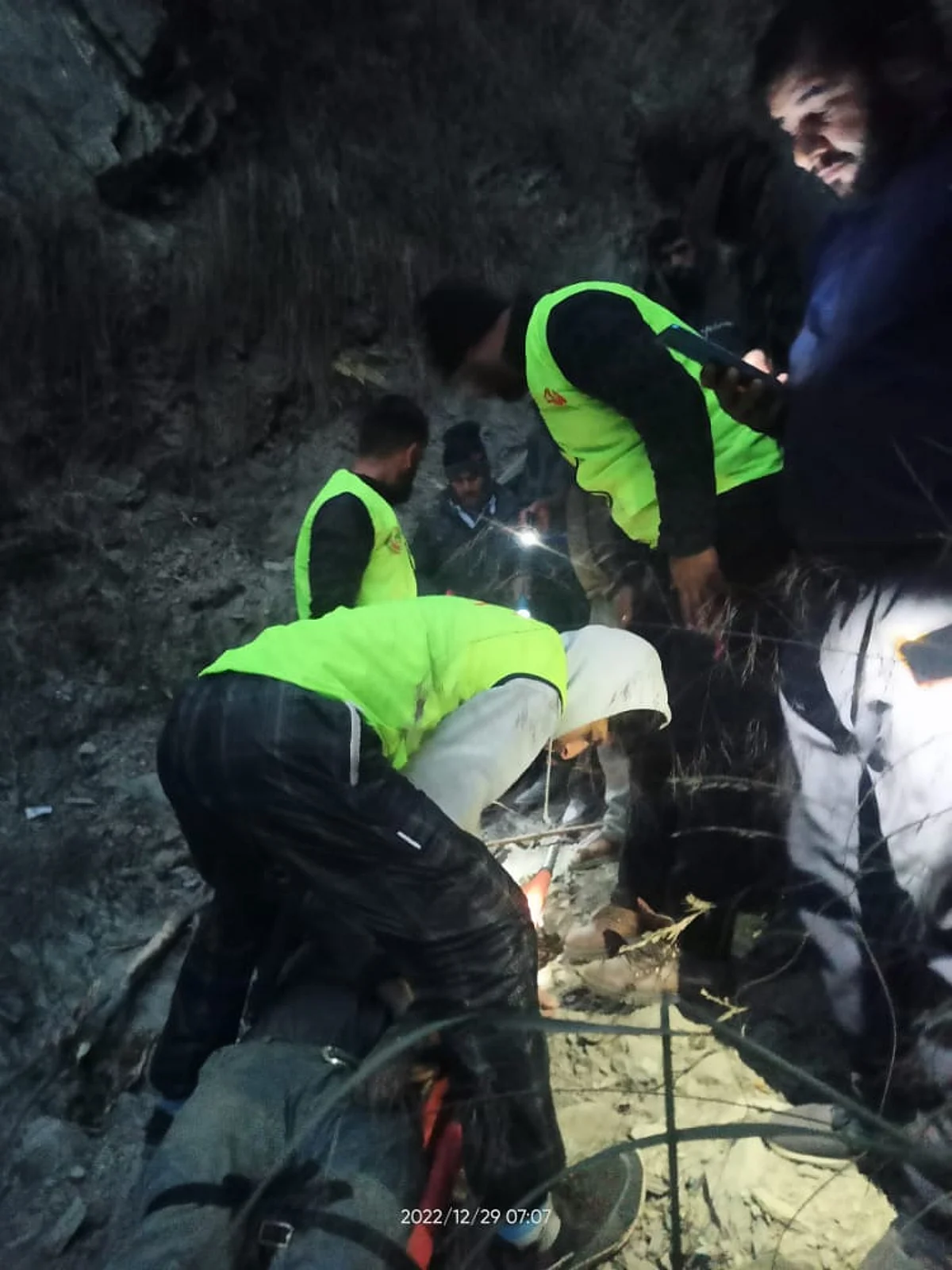 Rescuers at the accident site in Ramban