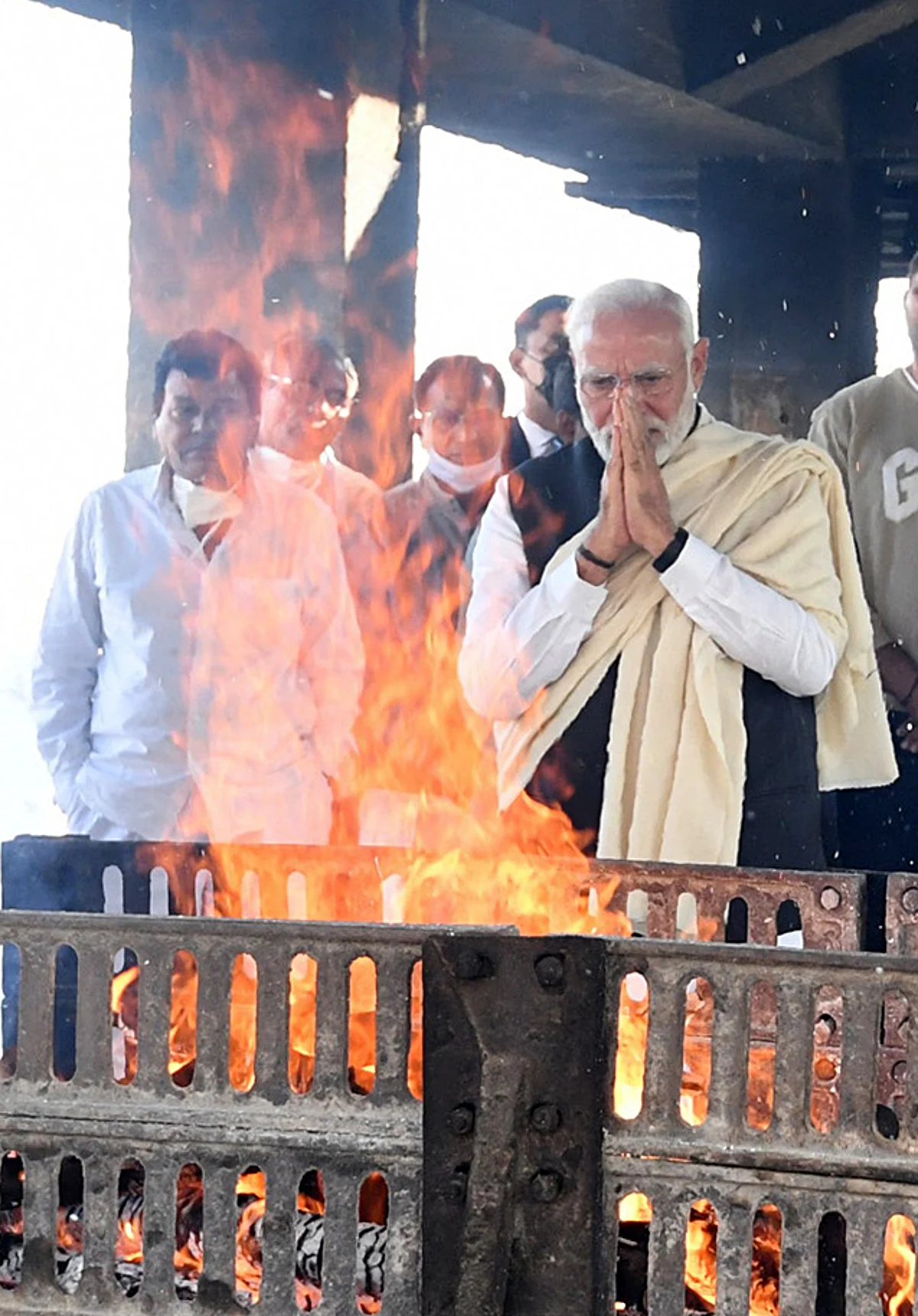 Prime Minister Narendra Modi attends last rites of his mother Heeraben Modi, in Gandhinagar on Friday.