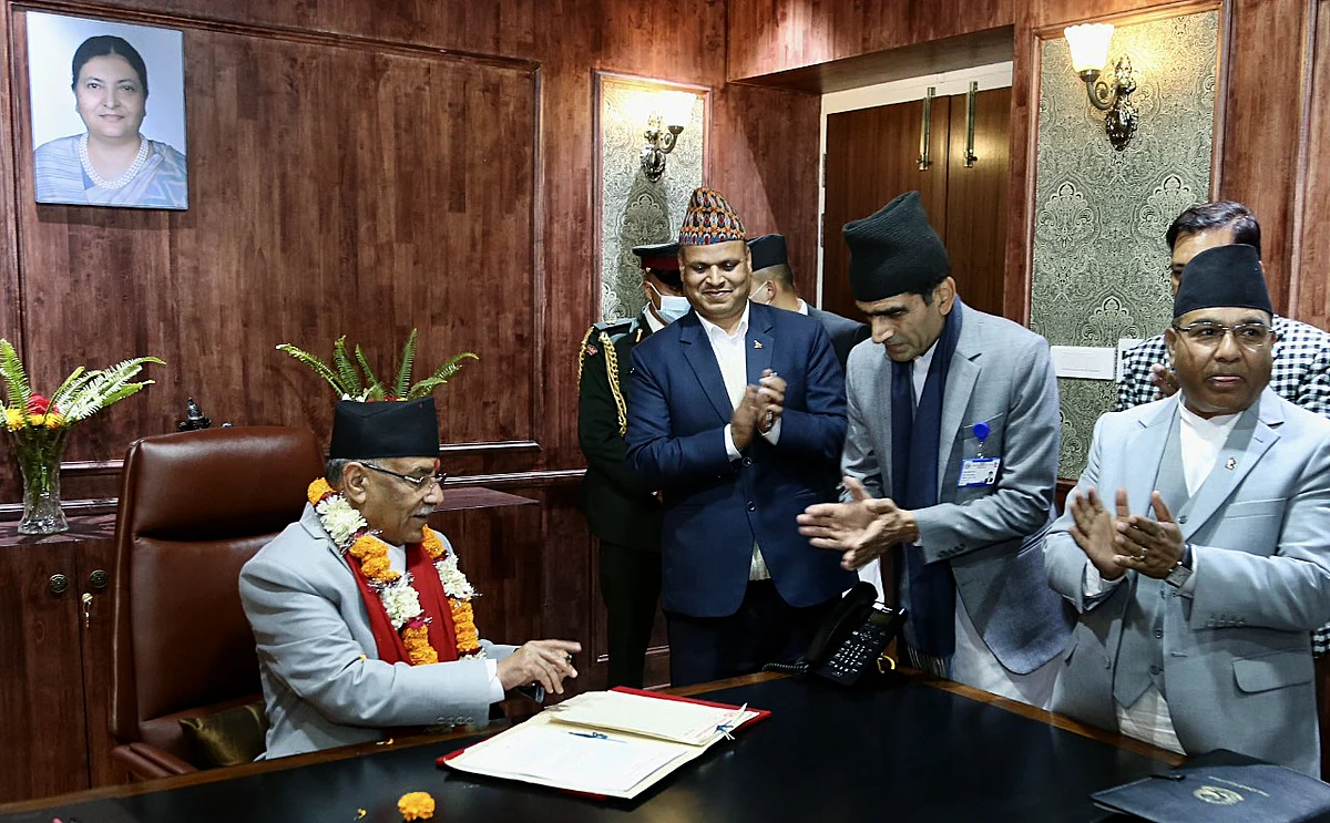 Newly appointed Prime Minister of Nepal, Communist Party of Nepal (Maoist Centre) Chairman Pushpa Kamal Dahal being greeted as he takes charge of his office as Nepal's newly appointed PM, in Kathmandu on Monday, 26-December-2022.