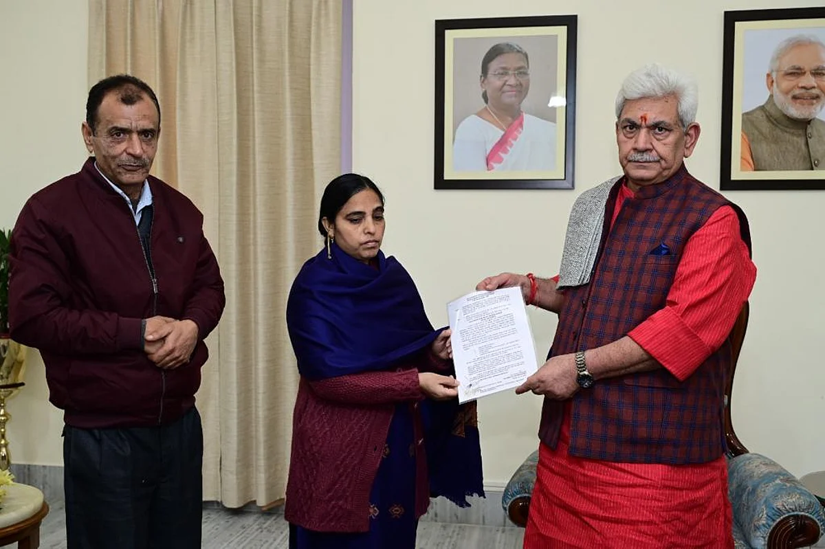 LG hands over appointment letter.