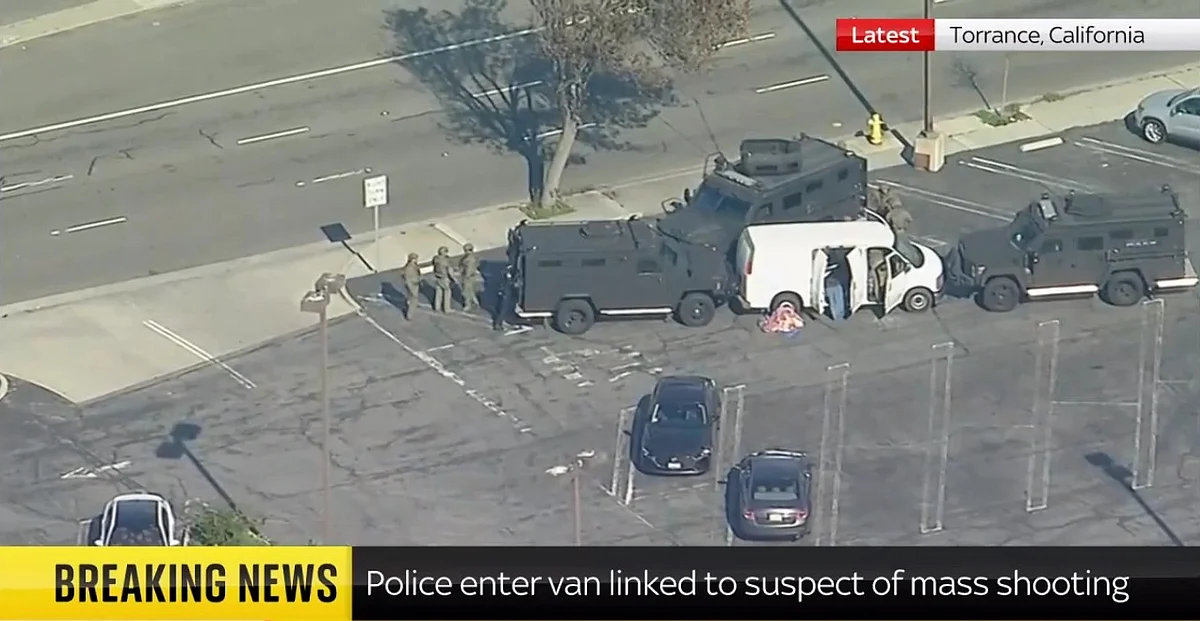 Police on Sunday afternoon surrounded a van believed to be belonging to the suspect involved in the shooting, Sky News reported.
