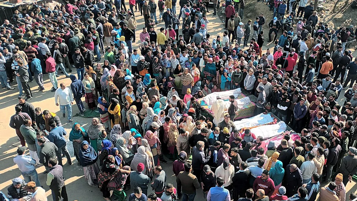 People gather around the dead bodies of those killed by terrorists in J&K's Rajouri.