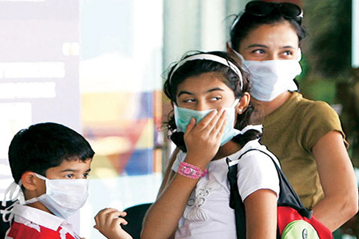 ‘Stay at arm’s length from persons coughing or sneezing, wash hands to check H1N1 spread’