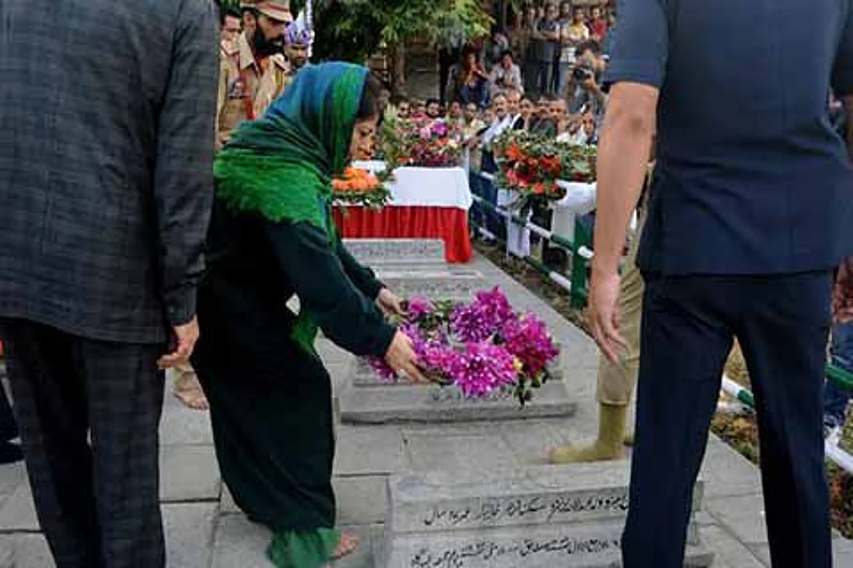 Mehbooba visits martyrs” graveyard, appeals for calm