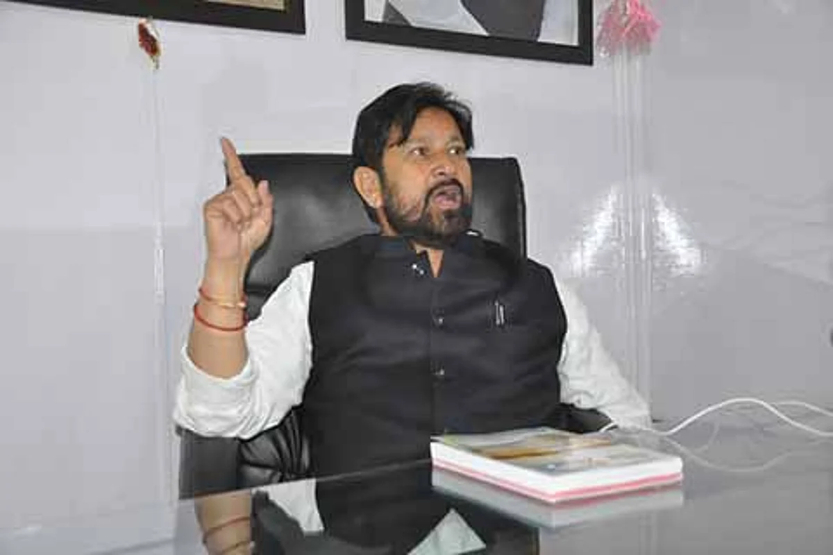 Lal Singh for removing encroachment on forest land