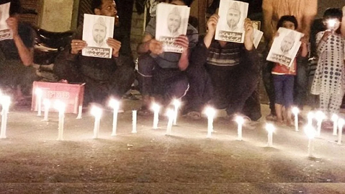Candle light protests in Anantnag