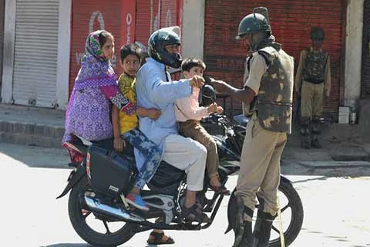 Caged in Curfewed Kashmir