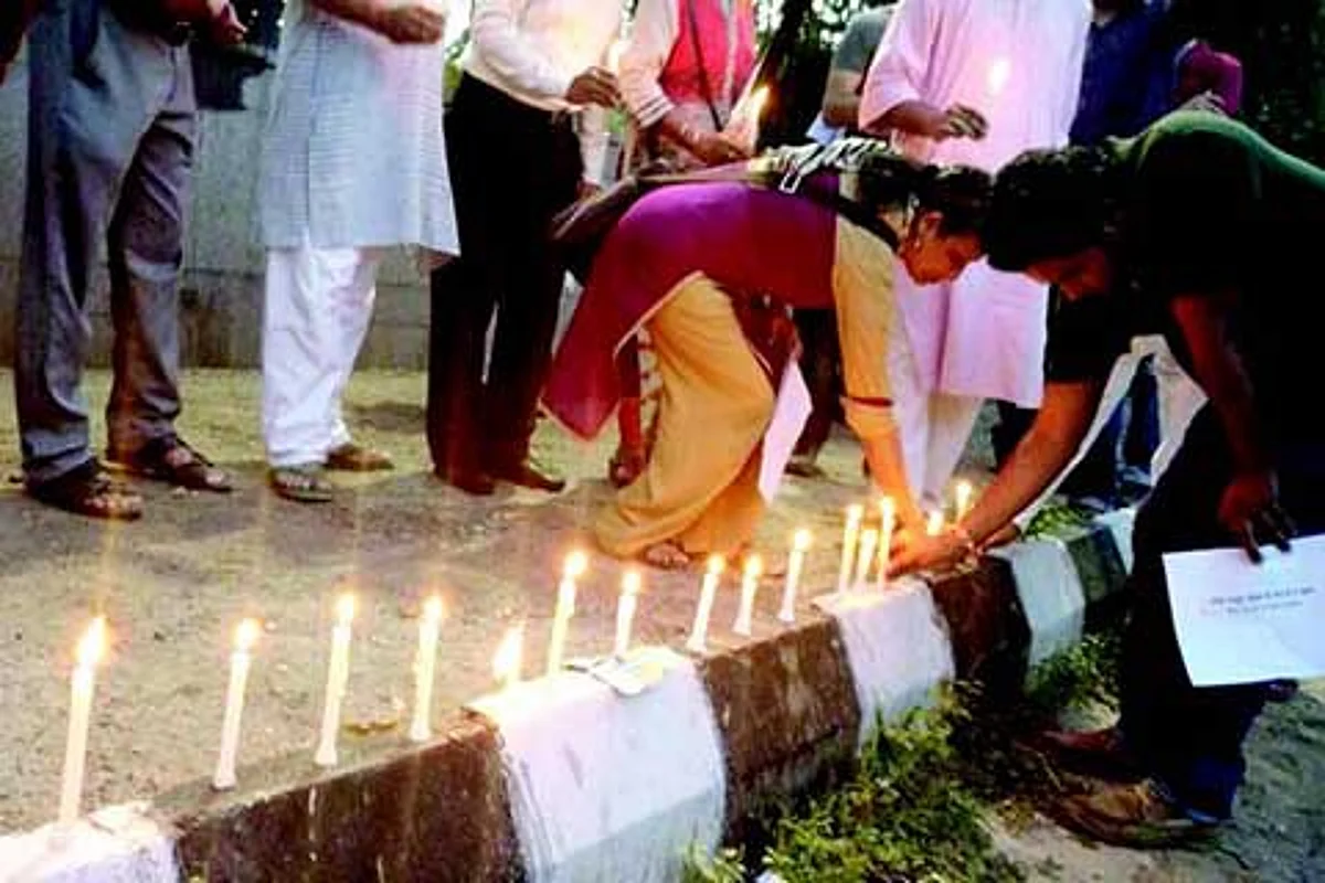 Civil society groups hold candlelight vigil in Delhi