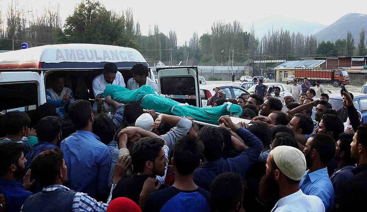 Eyes moist, hearts numb as Baramulla youth laid to rest