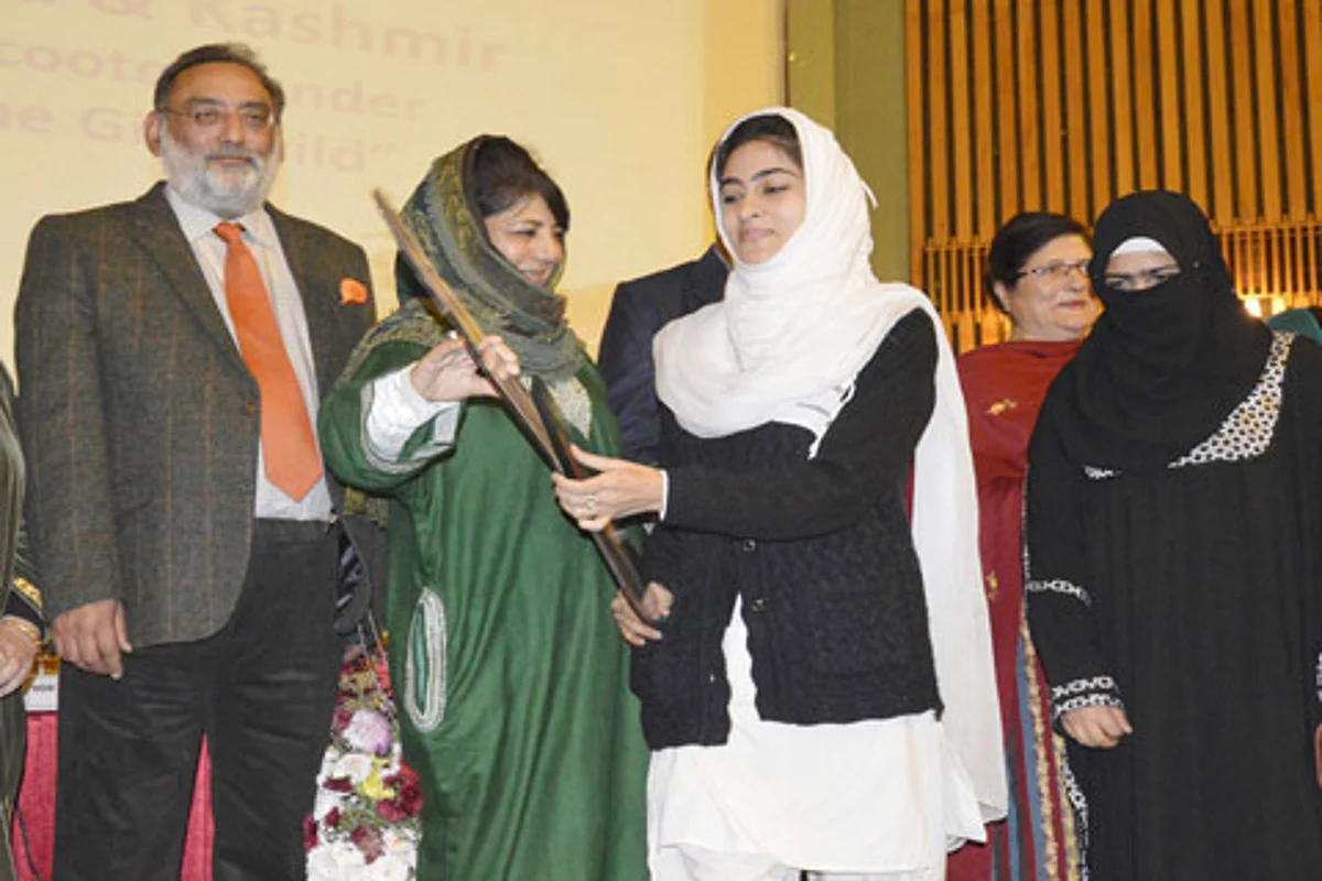 Mehbooba hands over keys of subsidized scooties to girl students in Kashmir