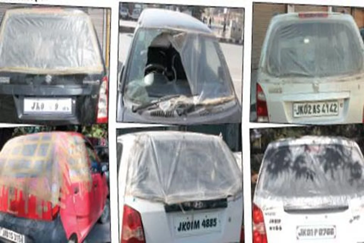 In strike-ridden Kashmir, replacing damaged car windowpanes daunting task