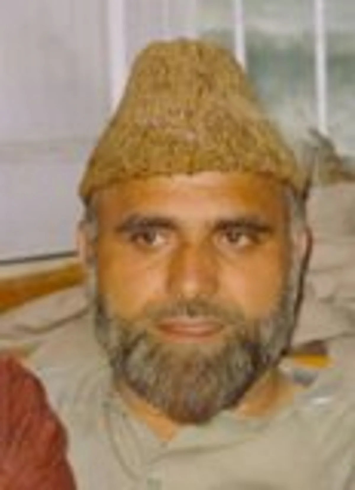 Geelani, Malik, Mirwaiz pay tributes to Qazi Nisar