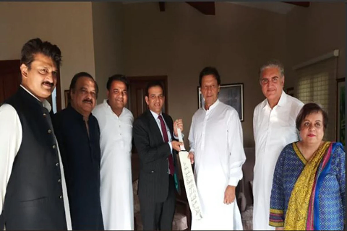 Indian envoy meets Imran Khan, gifts bat signed by Indian team