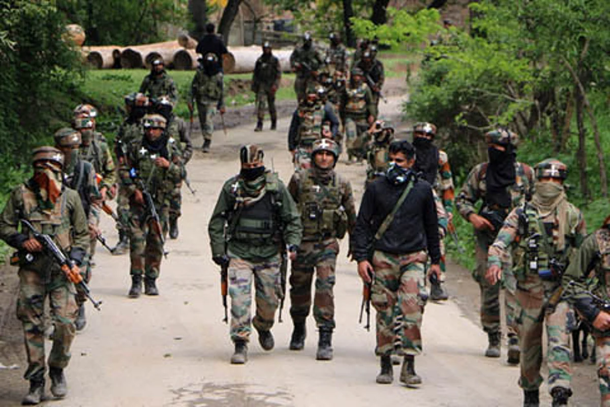 Forces lay siege to Shopian village, begin searches