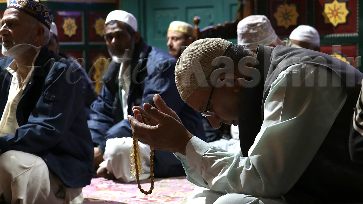 A Kashmiri Muslim prays at a shrine in Srinagar