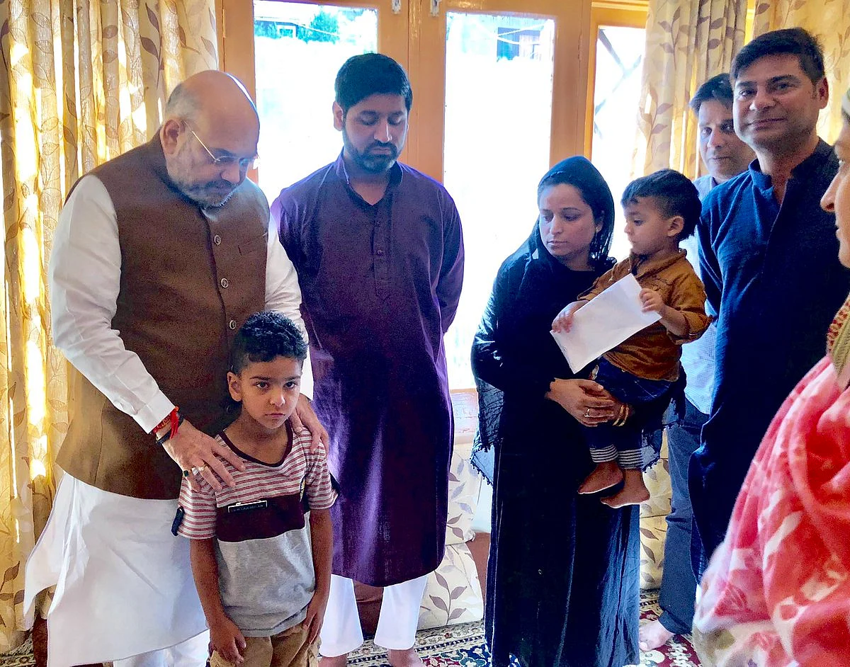 Nation is proud of your son, Amit Shah tells family of slain Kashmir police officer