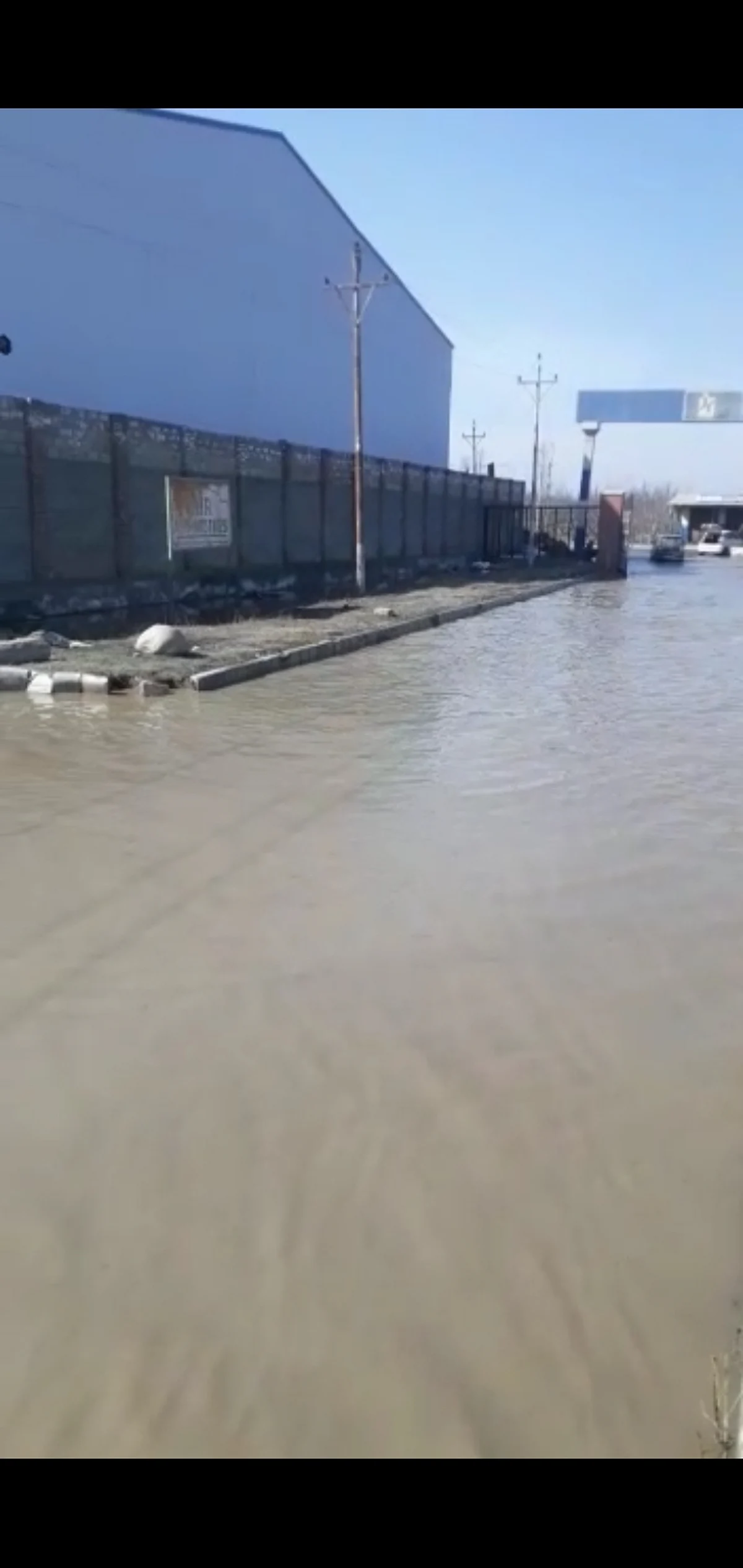 Waterlogged road at Lassipora IE irk industrialists