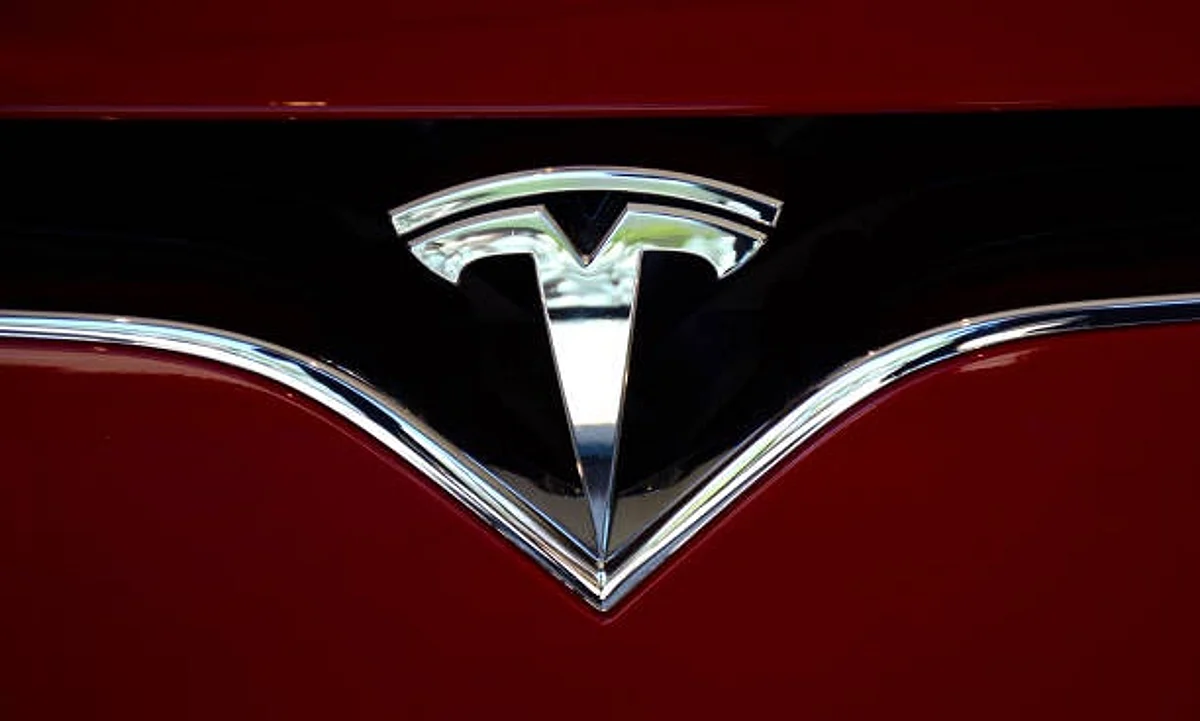 VAIL, CO - JUNE 9, 2017: The Tesla brand logo embellishes the nose of a Tesla electric sedan in Vail, Colorado. (Photo by Robert Alexander/Getty Images)