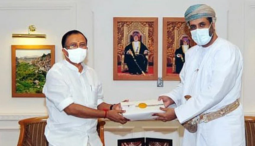 Minister of State for External Affairs V. Muraleedharan presents a memento to Oman's Labour Min Prof. Mahad Baawain. An Indo-Oman joint venture - Sebacic Oman - has rolled out a $1.2 billion project to set up the largest sebacic acid plant in the Middle East.