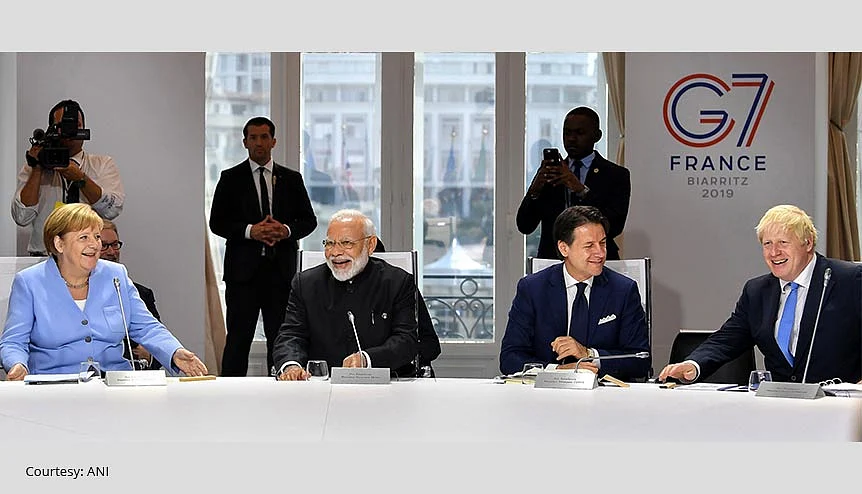 Prime Minister Narendra Modi, UK Prime Minister Boris Johnson, German Chancellor Angela Merkel in the session on ‘Biodiversity, Oceans, Climate’, at the G7 Summit, in 2019. India has been confirmed as one of three guest nations to join the G7 summit presided over by the UK in June this year, having been personally invited by Johnson.