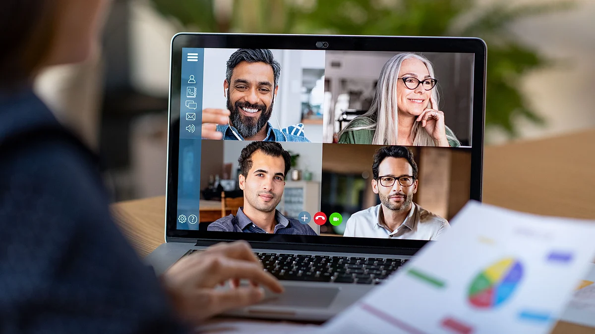 A multi-ethnic team on a video call. Former US President Trump had suspended the H1B visa programme that US and Indian IT companies used to send professionals to work sites in that country.
