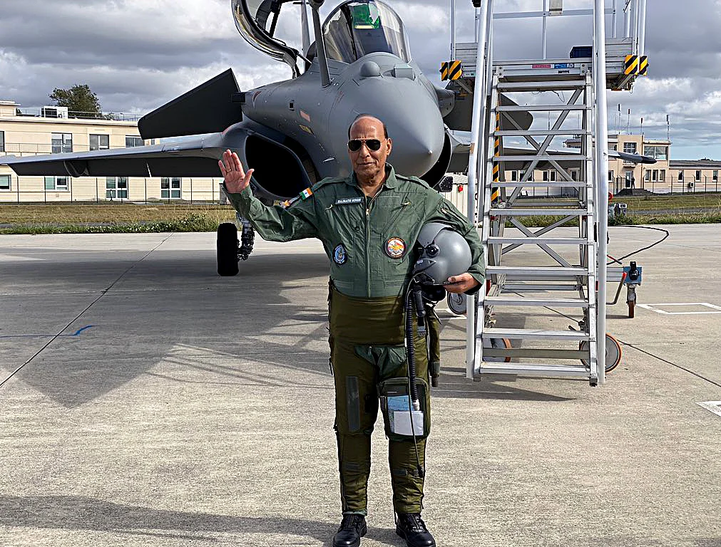 Sky’s the limit. Indian defence minister Rajnath Singh after a test flight on the Rafale fighter jet with a test pilot from Dassault Aviation. The big guns in the world of defence are eyeing the prospect of doing business with India in anticipation.